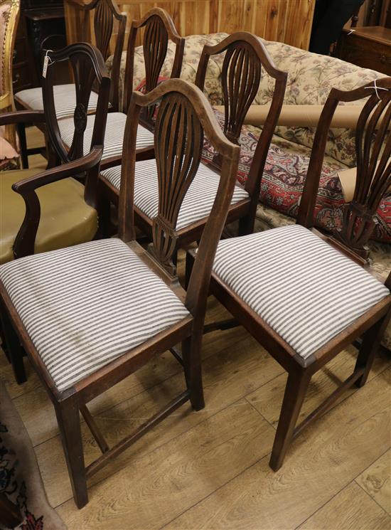 Five George III mahogany dining chairs
